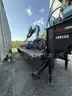 Heavy duty trailer with hydraulic arm