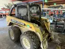 John deere 240 skid steerer