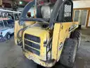 John deere 240 skid steerer