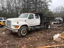 three 1996 ford f700 dump trucks