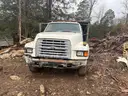 three 1996 ford f700 dump trucks