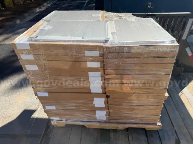 pallet of new  dry erase boards