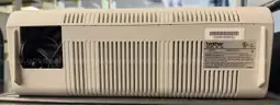 Brother ML 100 Standard typewriter with lid, various ribbons and corrective film ribbons, and cushioned pad (works!)