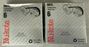 Brother ML 100 Standard typewriter with lid, various ribbons and corrective film ribbons, and cushioned pad (works!)