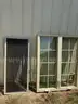 Two large windows with crank outs on each side and a screen for each side