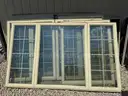 One large bay window with crank outs on each side