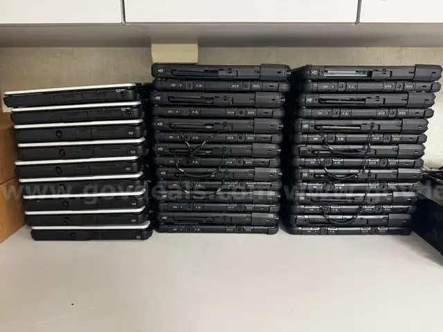 lot of Panasonic Toughbooks and Adapters