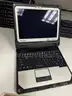 lot of Panasonic Toughbooks and Adapters