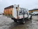 2015 Ford F-550 with HAUL ALL Garbage Collector