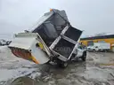 2015 Ford F-550 with HAUL ALL Garbage Collector
