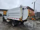 2015 Ford F-550 with HAUL ALL Garbage Collector