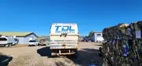 Garbage Truck, 2002 Sterling Side Loader