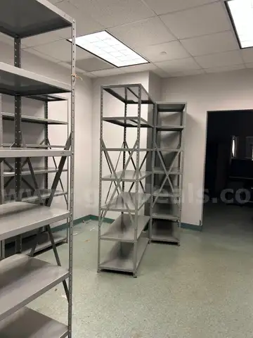 One lot of (20) storage shelves metal