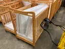 Lot of 16 Wood Cribs - all on wheels