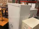 Lot of 4 metal cabinets (used) and 12 light up boards (new)