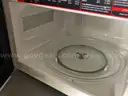 Refrigerator, microwave, Keurig, chairs, tables