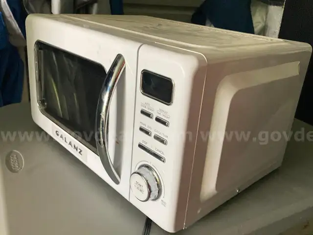 Refrigerator, microwave, Keurig, chairs, tables