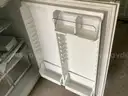 Refrigerator, microwave, Keurig, chairs, tables