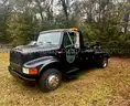1997 International 4700 medium duty tow truck. Ready to work!
