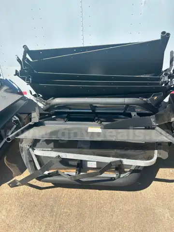 Mixed assortment of protection barriers removed from patrol vehicles.