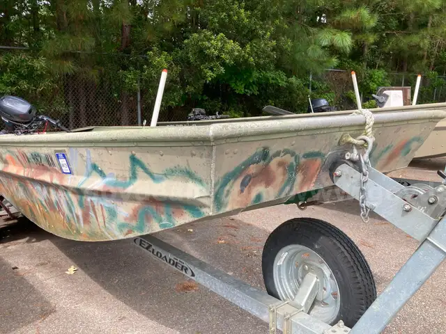 Godfrey Marine Polar Kraft boat with Yamaha Motor on EZ Loader Trailer