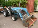 Ford 1720 Tractor with front bucket attachment