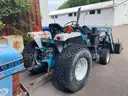 Ford 1720 Tractor with front bucket attachment
