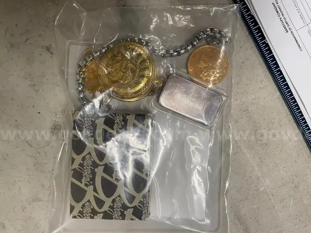 Lot Including (1) Gold Coin, (1) Gold Pocket Watch, (1) Gold Bracelet, (1) Silver Bar, (1) Silver Bracelet