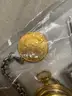 Lot Including (1) Gold Coin, (1) Gold Pocket Watch, (1) Gold Bracelet, (1) Silver Bar, (1) Silver Bracelet
