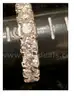 14 KARAT WHITE GOLD ENGAGEMENT RING (NATURAL DIAMONDS)