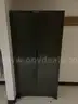 Cabinet full of miscellaneous welding supplies