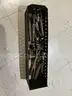 Cabinet full of miscellaneous welding supplies