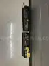 Cabinet full of miscellaneous welding supplies