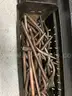 Cabinet full of miscellaneous welding supplies