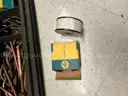 Cabinet full of miscellaneous welding supplies