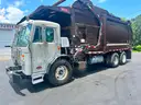 2009 Peterbilt 320 Heil front loader