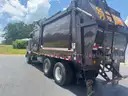2009 Peterbilt 320 Heil front loader
