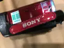 LOT OF 8 SONY HANDYCAM DCR-SX44 /RED W/BATT,CHARGER,CABLE'S
