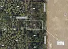 +/- 5000 sq ft. - acre undeveloped lot in a platted subdivision near Orange City / DeLand, FL