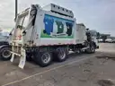 2016 Peterbilt 320 COE Side Load Garbage Truck – CNG