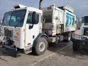 2016 Peterbilt 320 COE Side Load Garbage Truck – CNG