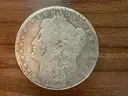 Lot of four Morgan Silver Dollars (1882, 1890 O, 1899 O, 1886 O)