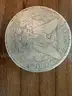 Lot of four Morgan Silver Dollars (1882, 1890 O, 1899 O, 1886 O)