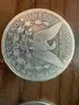 Lot of four Morgan Silver Dollars (1882, 1890 O, 1899 O, 1886 O)