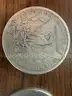 Lot of four Morgan Silver Dollars (1882, 1890 O, 1899 O, 1886 O)