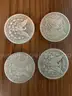 Lot of four Morgan Silver Dollars (1882, 1890 O, 1899 O, 1886 O)