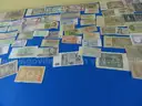 Lot of 63 Foreign Paper Currencies (Lot #10)