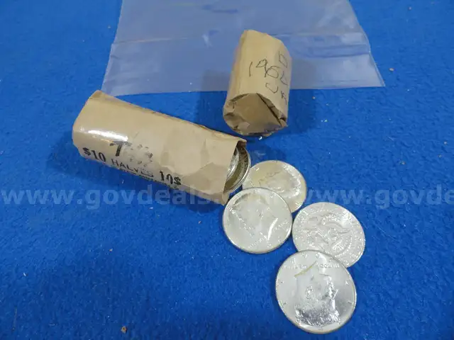 Two Rolls (40 Coins) of Uncirculated 90% Silver 1964-P &#x26; 1964-D Kennedy Half Dollars - (Lot #6)