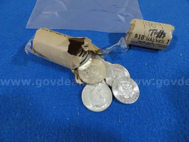 Two Rolls (40 Coins) of Uncirculated 90% Silver 1964-P &#x26; 1964-D Kennedy Half Dollars - (Lot #7)