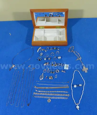 Large Lot of Gold and Silver Jewelry in Musical Jewelry Box